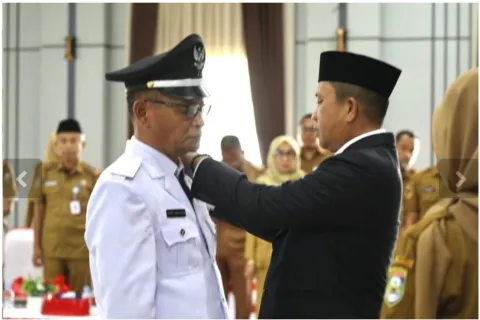 Bupati Morowali Iksan, Lantik Kepala Desa PAW Laroue, Simon Abd Rasyid
